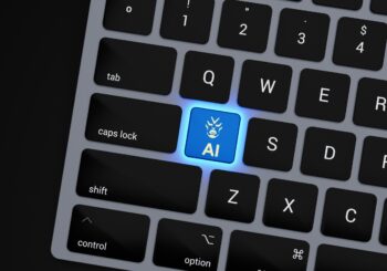 a close up of a keyboard with a blue button